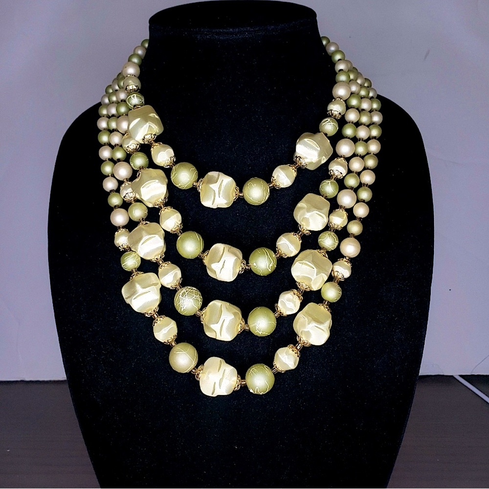 Vintage Japan 4 strands glass and acrylic beads. Light lemony green and cream